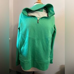 Under Armor. Green pullover. Fitted. Size M.